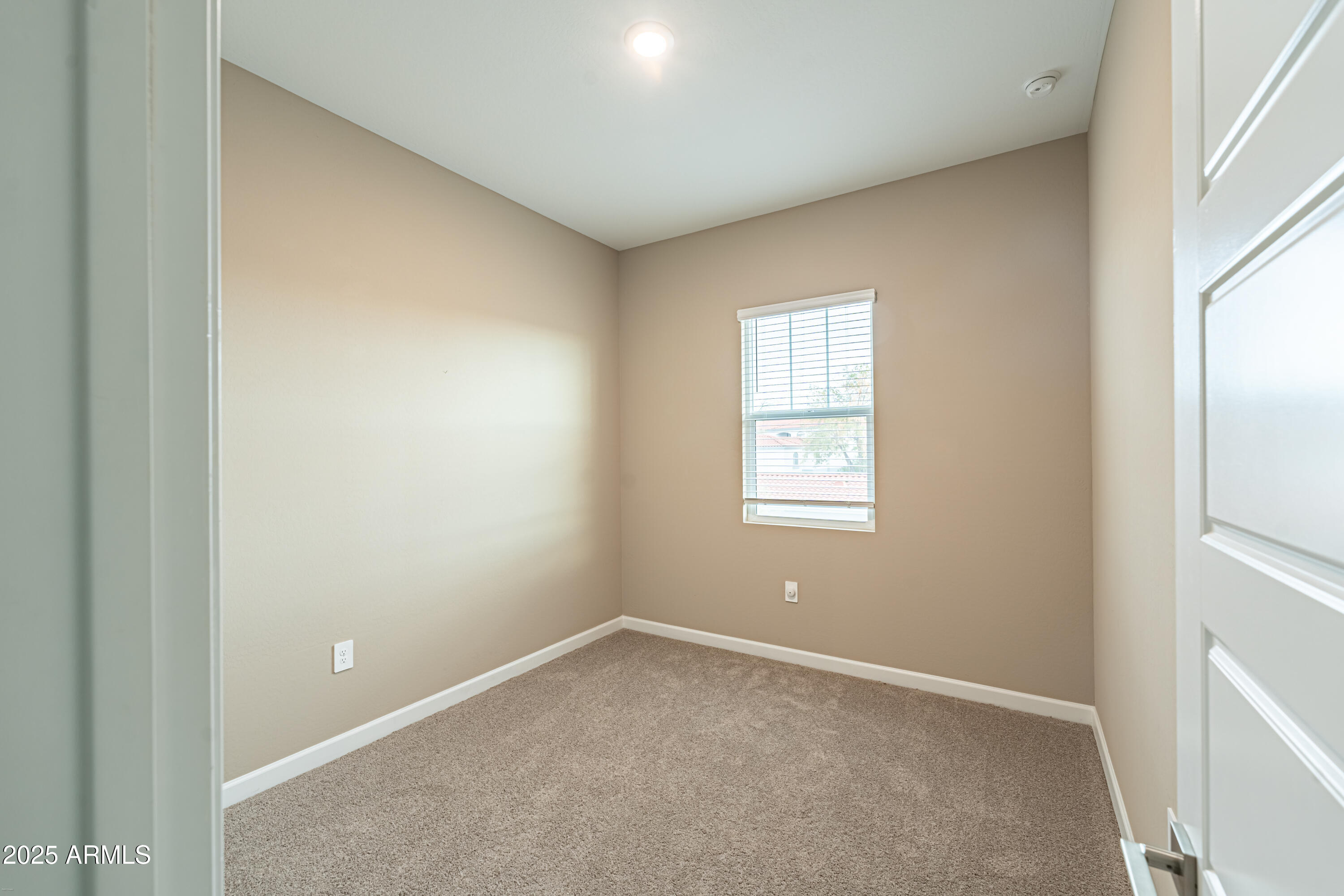 4838 East Helena Drive Scottsdale, AZ 85254 - Photo 28 of 32 an empty room with a window