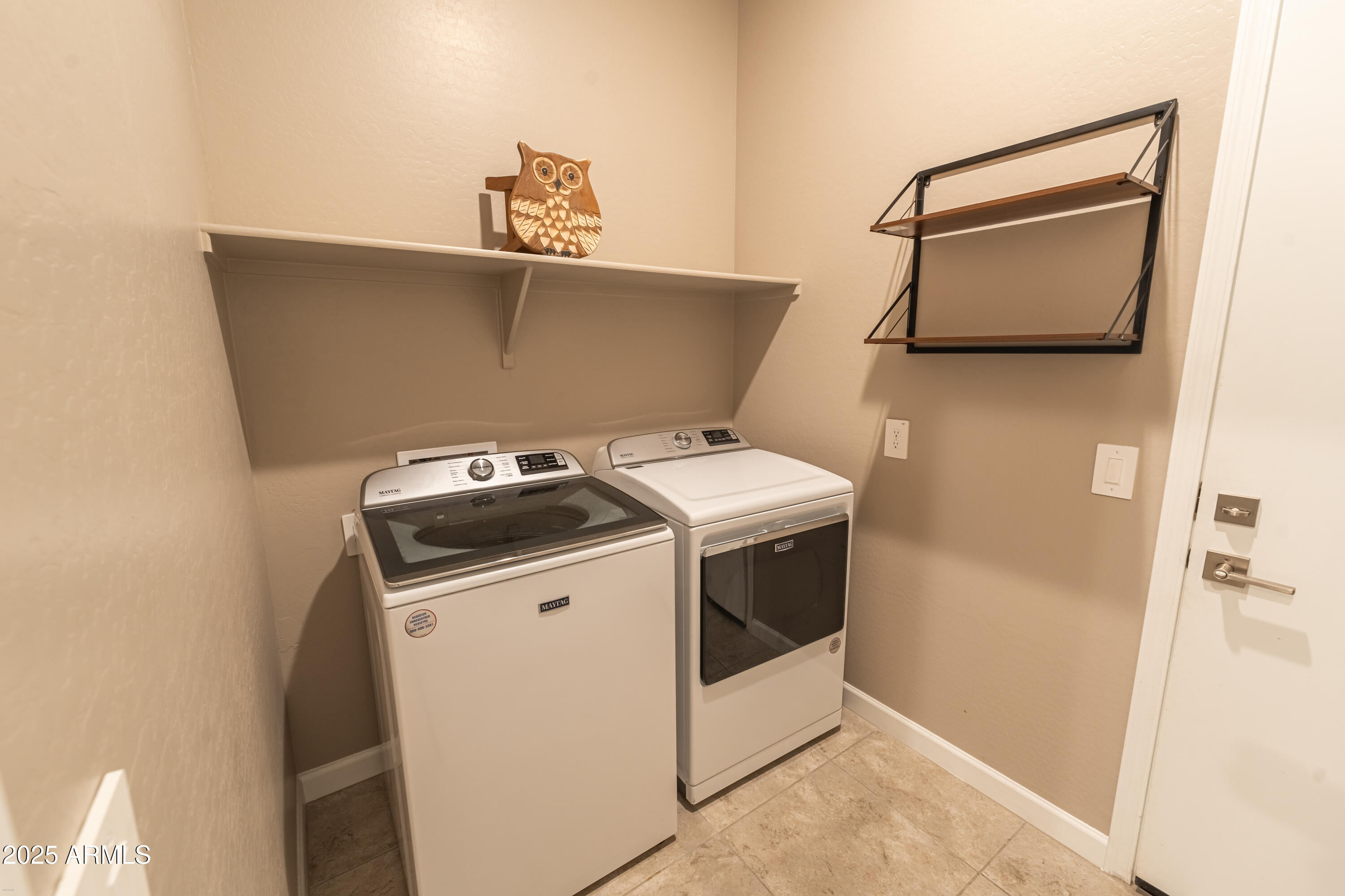 4838 East Helena Drive Scottsdale, AZ 85254 - Photo 9 of 32 a utility room with dryer and washer