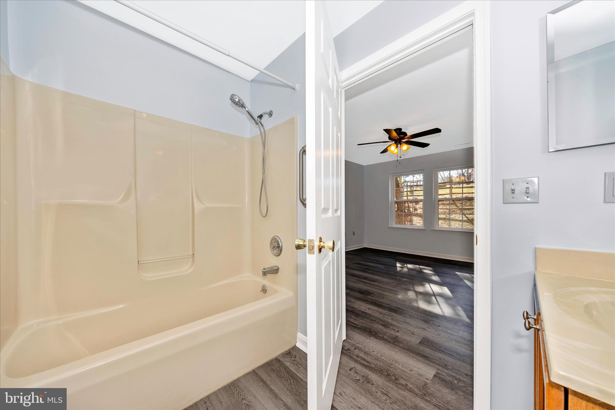 2402 Dominion Drive, Unit 1B Frederick, MD 21702 - Photo 27 of 66 a bathroom with a bathtub and a shower