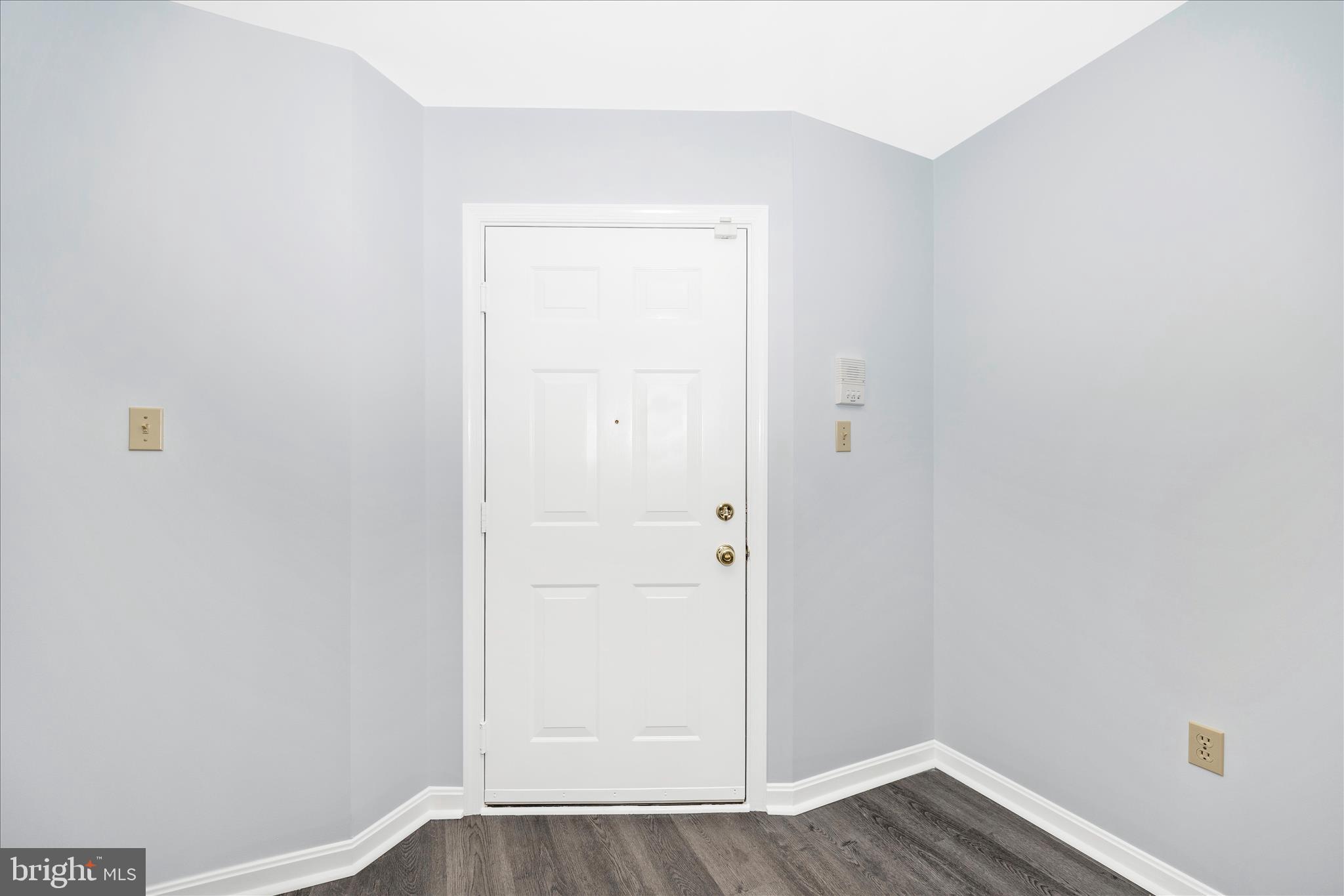 2402 Dominion Drive, Unit 1B Frederick, MD 21702 - Photo 3 of 66 a view of an empty room