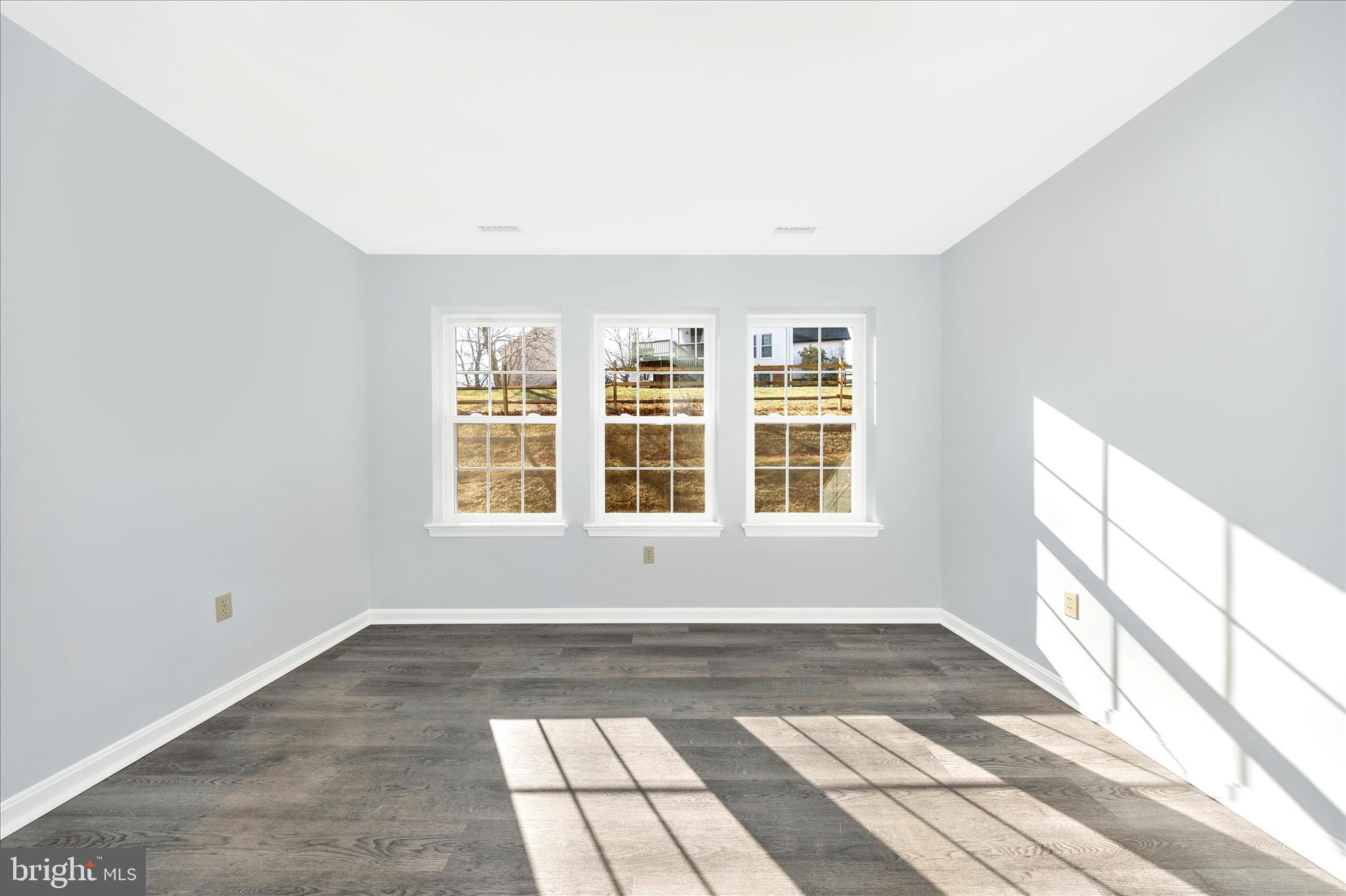 2402 Dominion Drive, Unit 1B Frederick, MD 21702 - Photo 31 of 66 a view of an empty room with a window