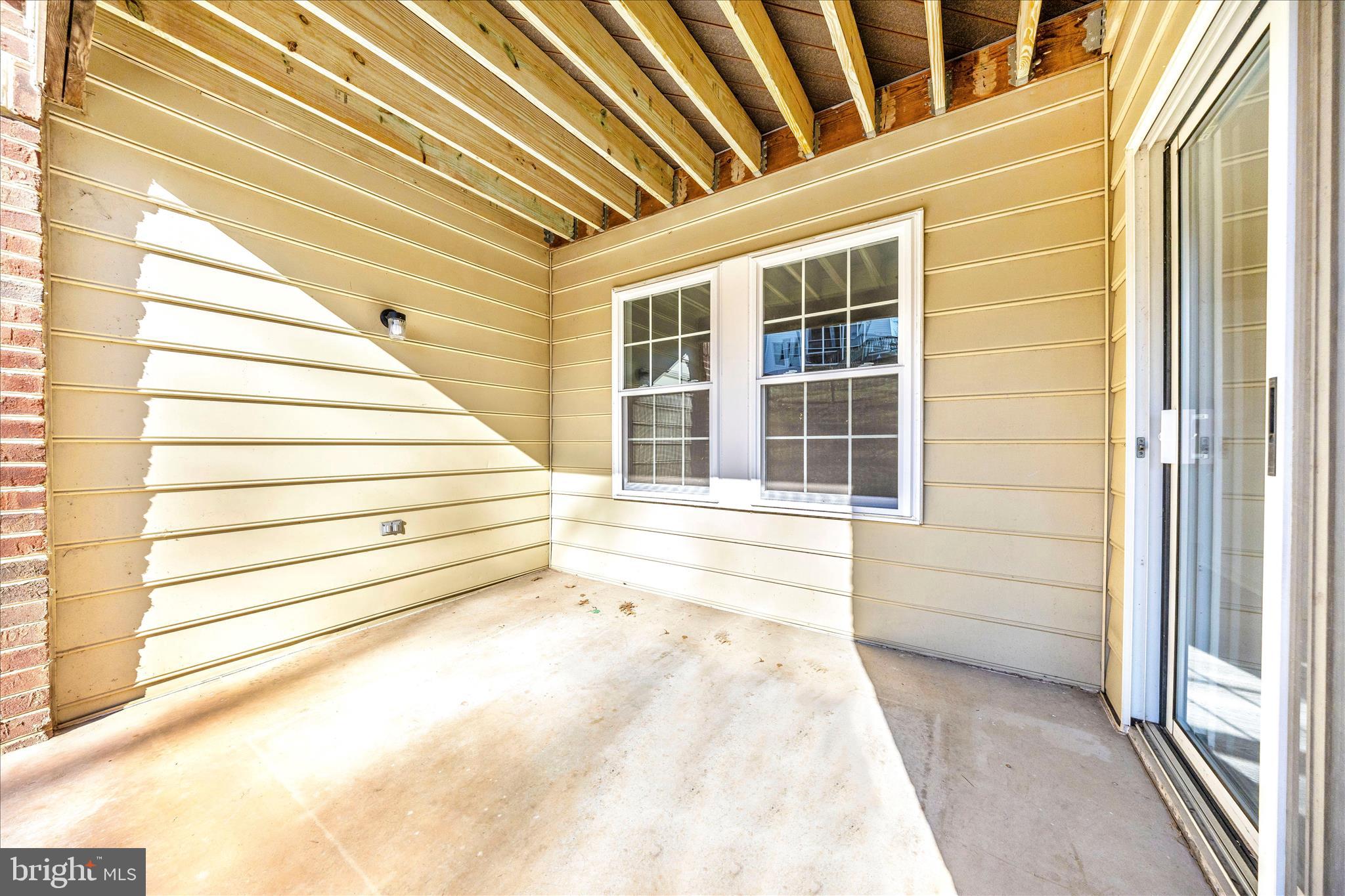 2402 Dominion Drive, Unit 1B Frederick, MD 21702 - Photo 47 of 66 a view of house with entryway and stairs