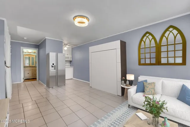 a view of a livingroom with furniture and window