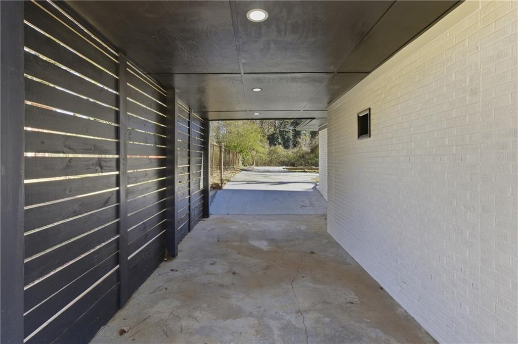 1410 Willis Mill Road Southwest Atlanta, GA 30311 - Photo 26 of 33 a view of an empty room and windows