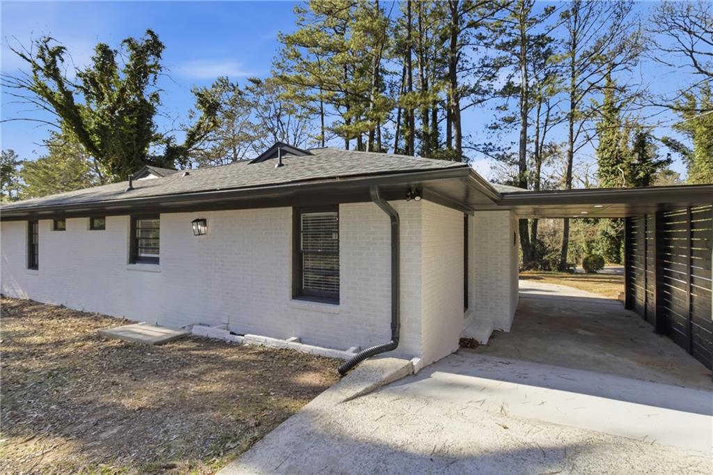 1410 Willis Mill Road Southwest Atlanta, GA 30311 - Photo 28 of 33 a view of a house with a tree