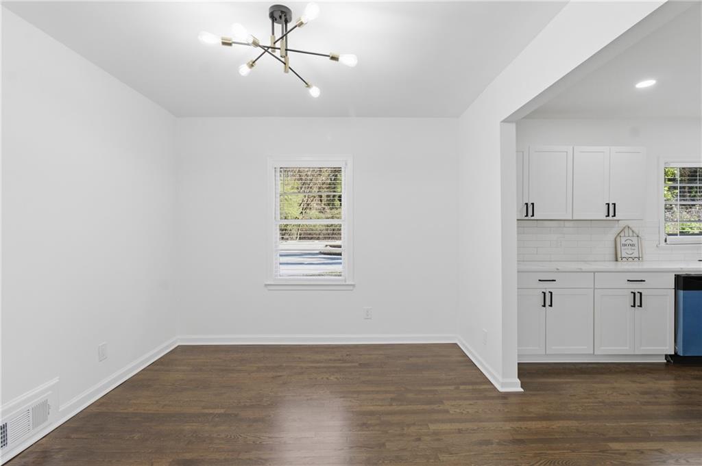 1410 Willis Mill Road Southwest Atlanta, GA 30311 - Photo 10 of 33 a view of a kitchen with electric appliances