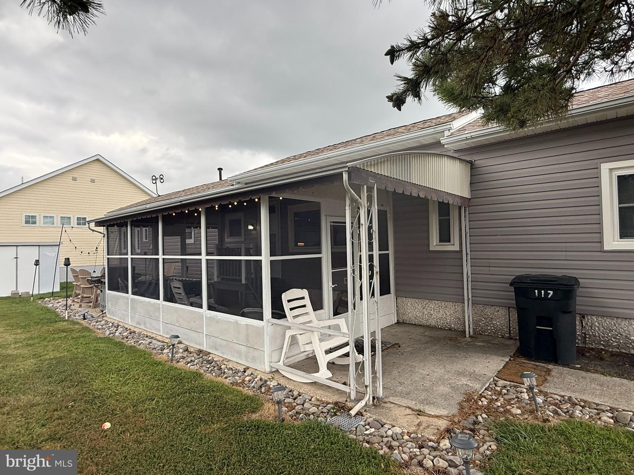 117 Clamshell Road Ocean City, MD 21842 - Photo 3 of 14 front view of a house with a large window