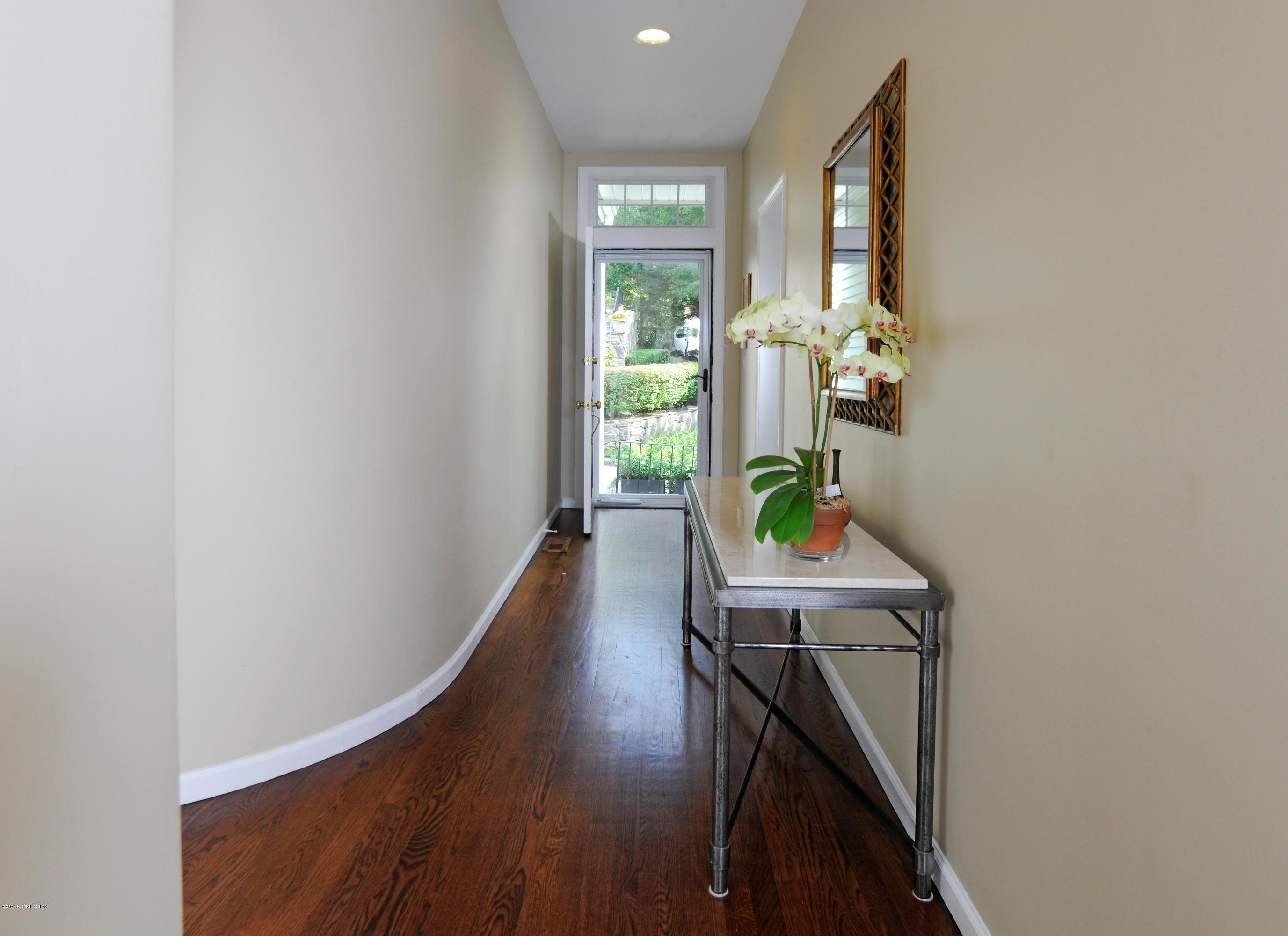 186 Field Point Road, Unit 4A Greenwich, CT 06830 - Photo 4 of 23 a view of entryway and workspace