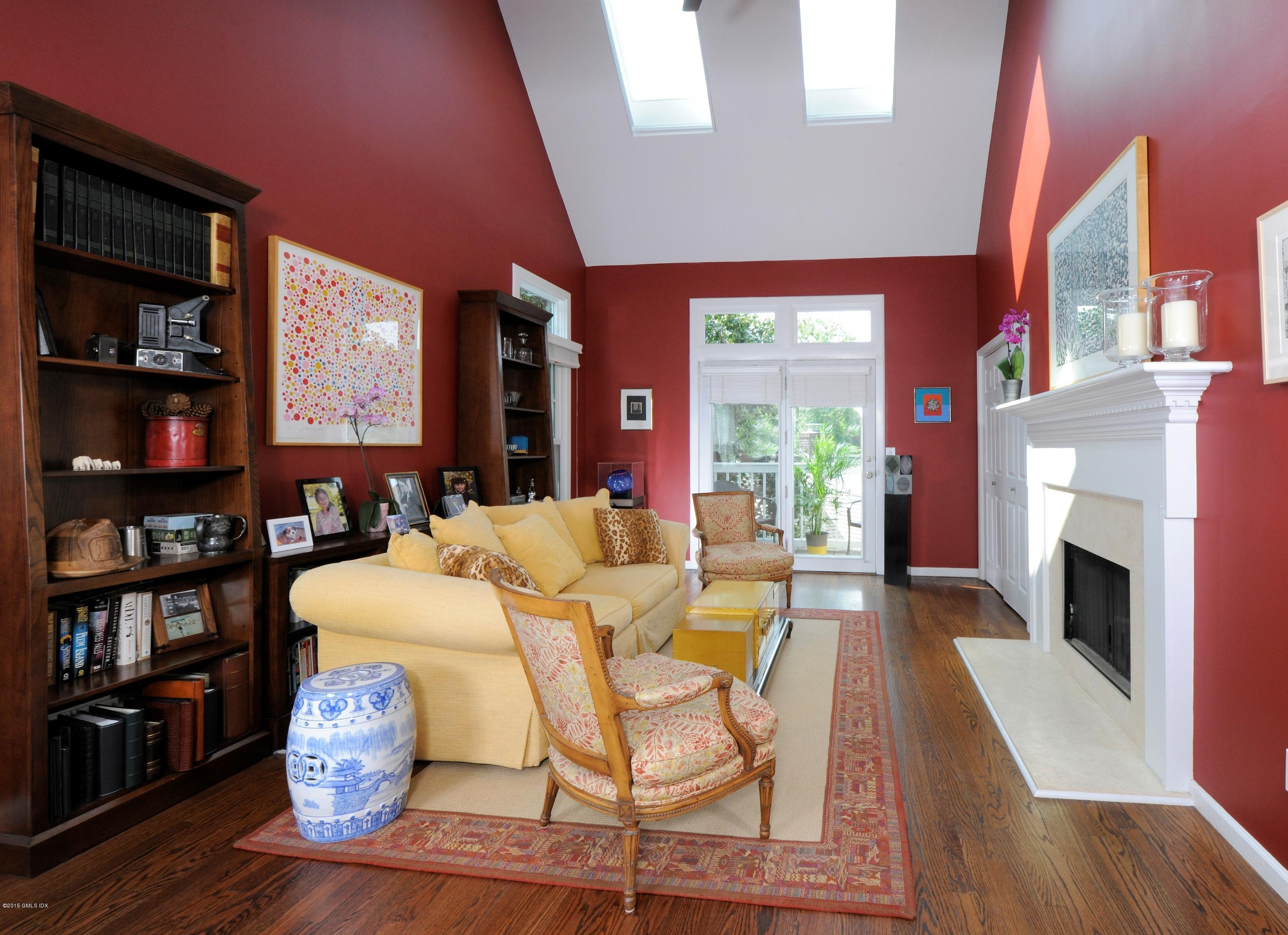 186 Field Point Road, Unit 4A Greenwich, CT 06830 - Photo 8 of 23 a view of a dining room with furniture window and wooden floor