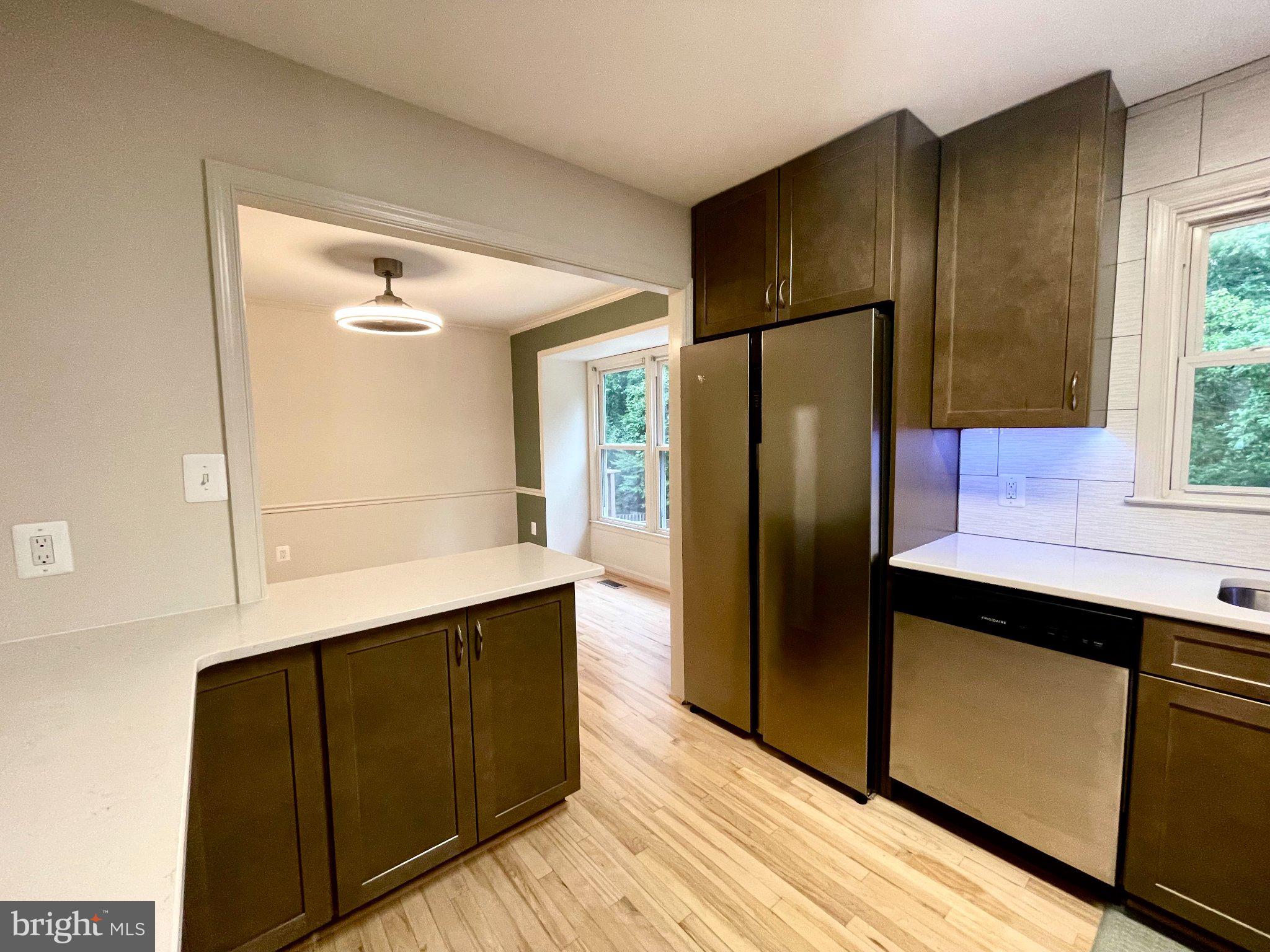 7925 Forest Path Way Springfield, VA 22153 - Photo 12 of 27 Kitchen opens up to the dining room