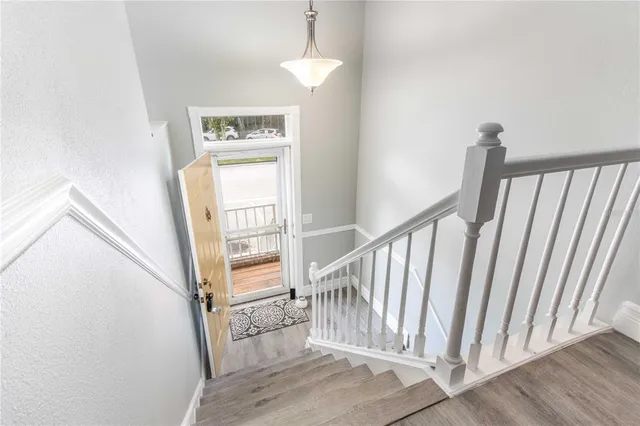 a view of a balcony with wooden floor