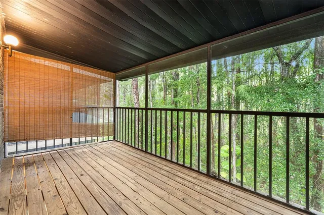 a picture of a bench in front of a door