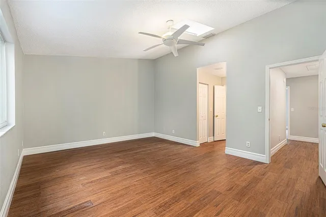 a view of a swimming pool with a patio
