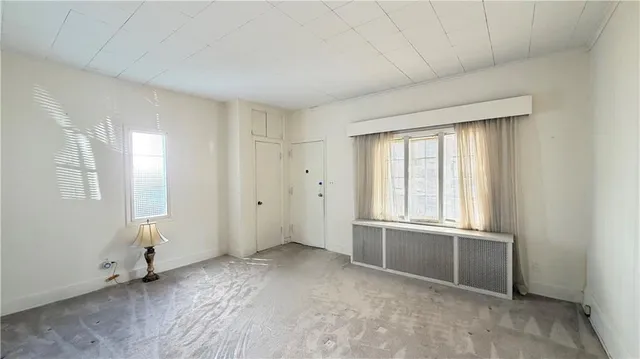 an empty room with windows