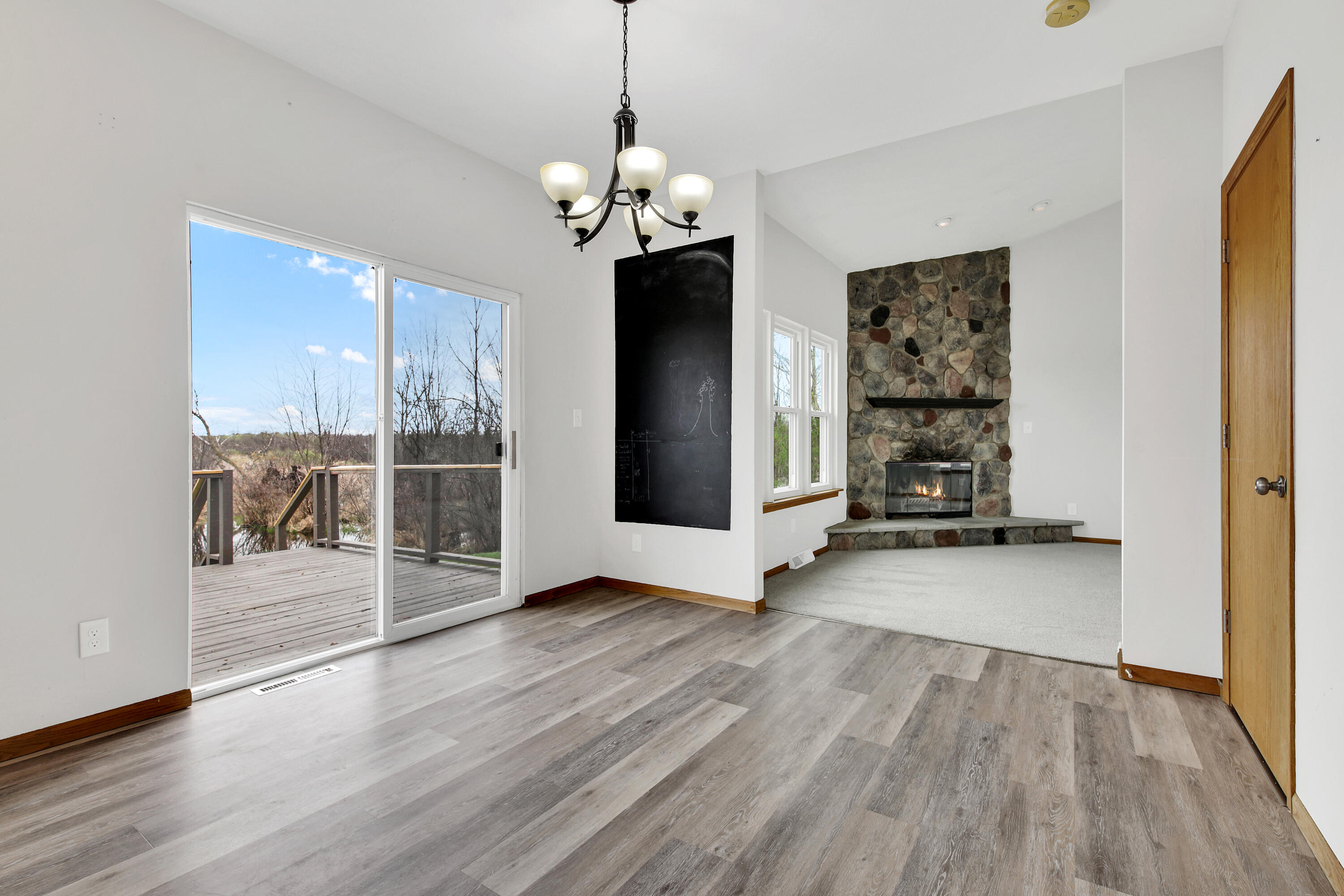 7809 East Wind Lake Road Norway, WI 53185 - Photo 9 of 33 Patio Door Opens to Large Deck