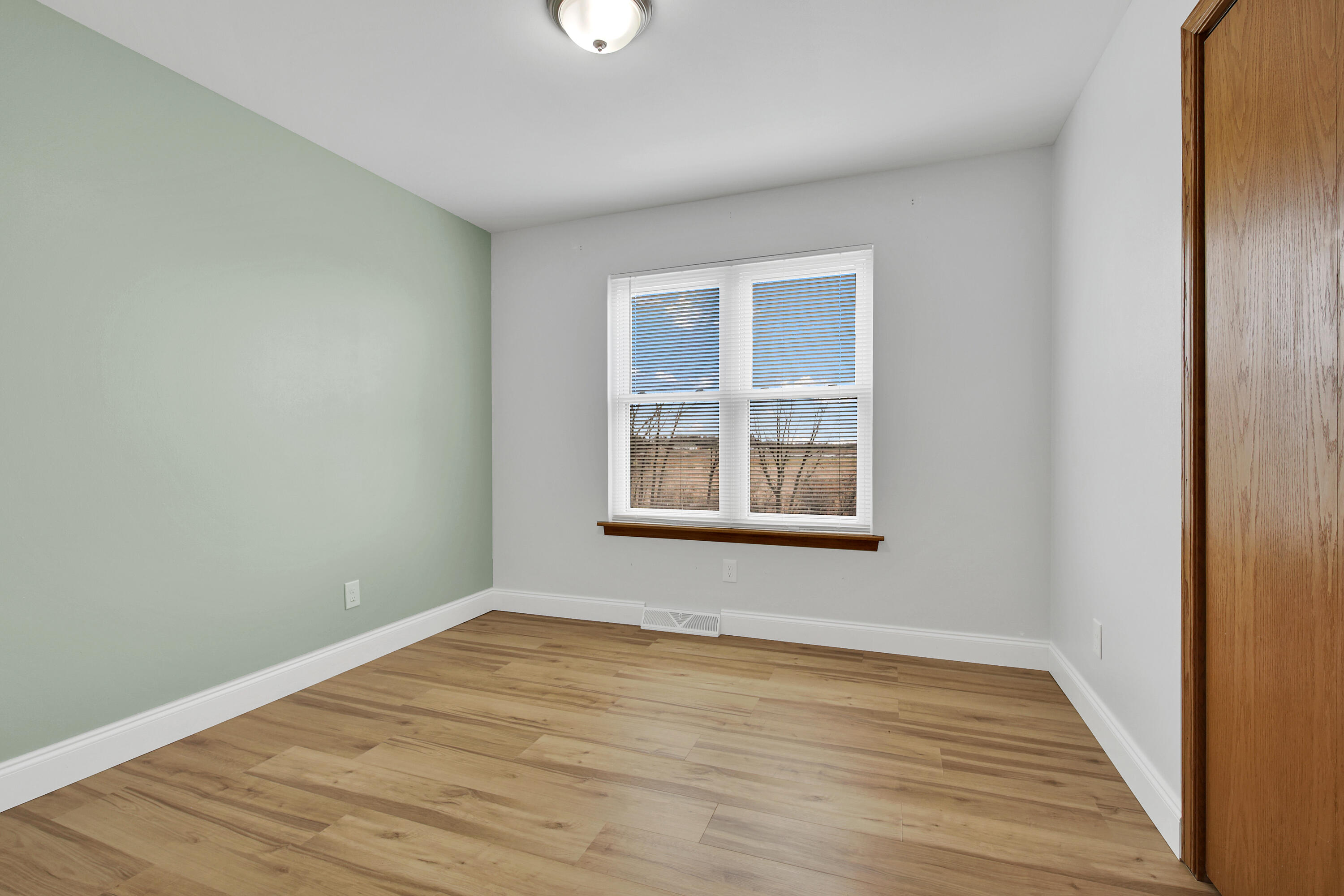 7809 East Wind Lake Road Norway, WI 53185 - Photo 22 of 33 Second Bedroom with LVP