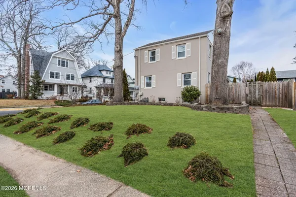 a view of a house with a garden