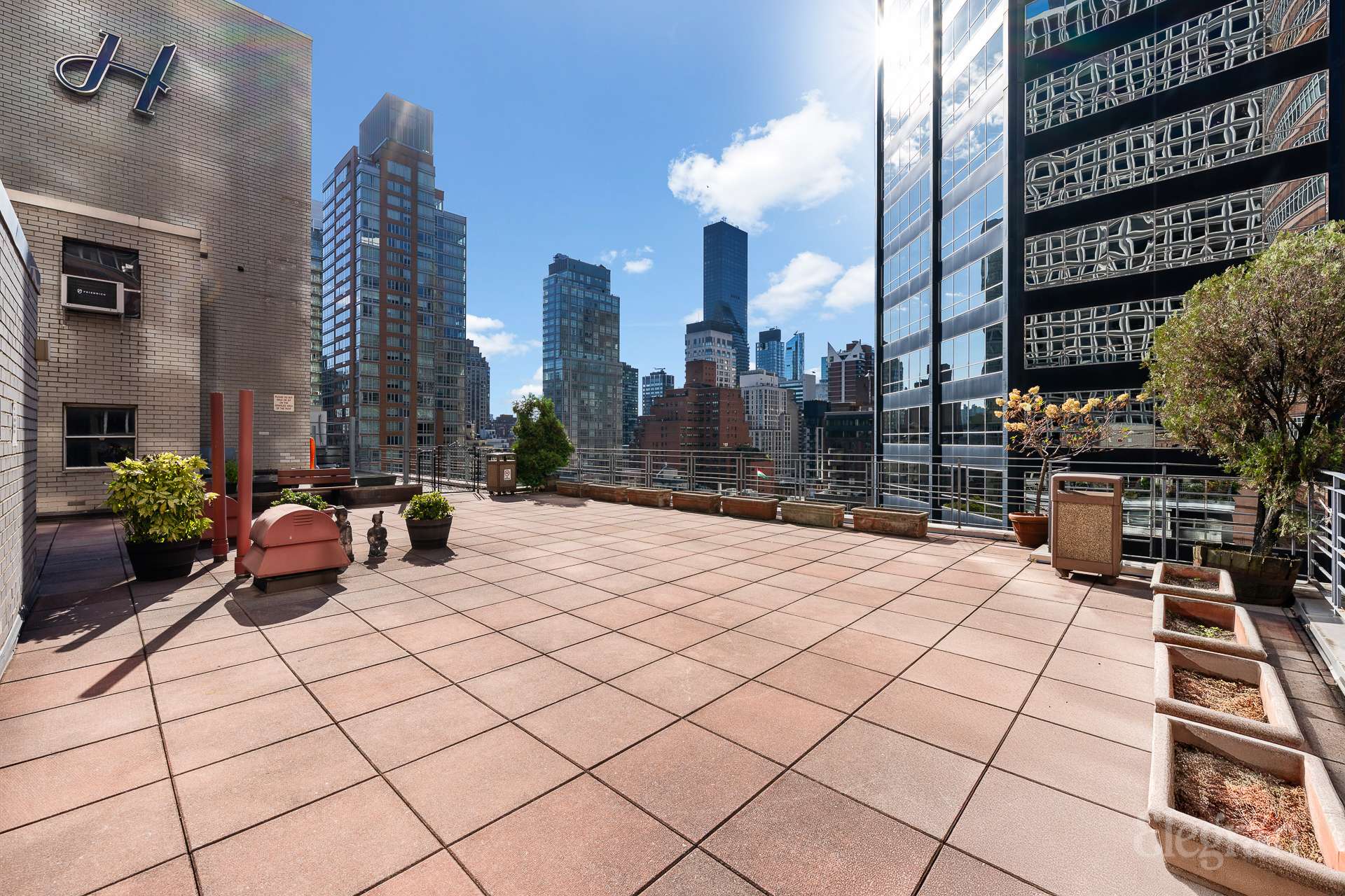 211 East 53rd Street, Unit 10F Manhattan, NY 10022 - Photo 7 of 8 a view of a terrace with chairs