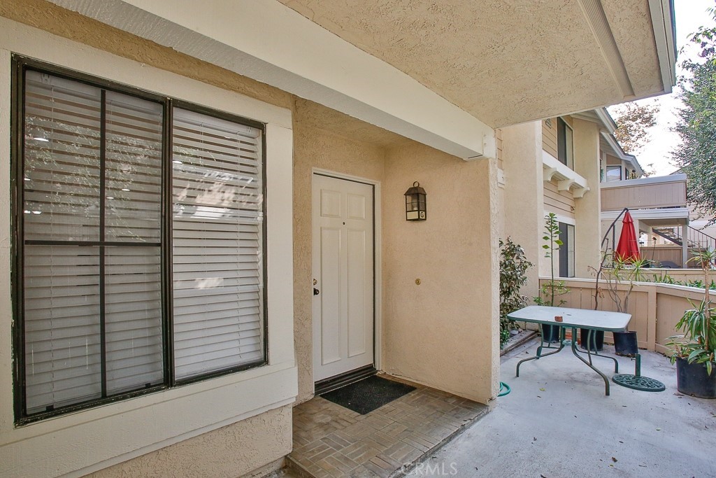12635 Briarglen Loop, Unit G Stanton, CA 90680 - Photo 5 of 19 a view of entryway and hall yard