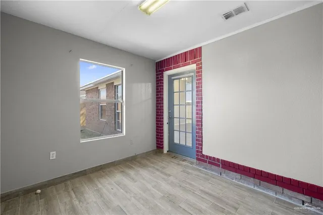 an empty room with windows