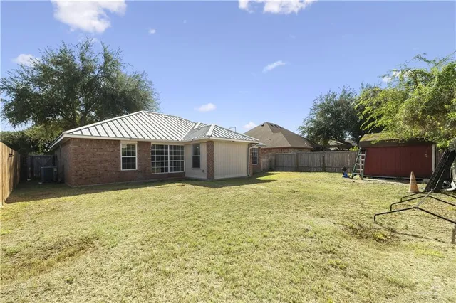 a house with yard in front of it