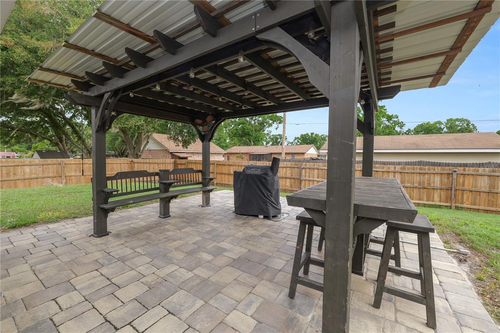 225 Lindale Street Lakeland, FL 33809 - Photo 31 of 37 a view of backyard with sitting area