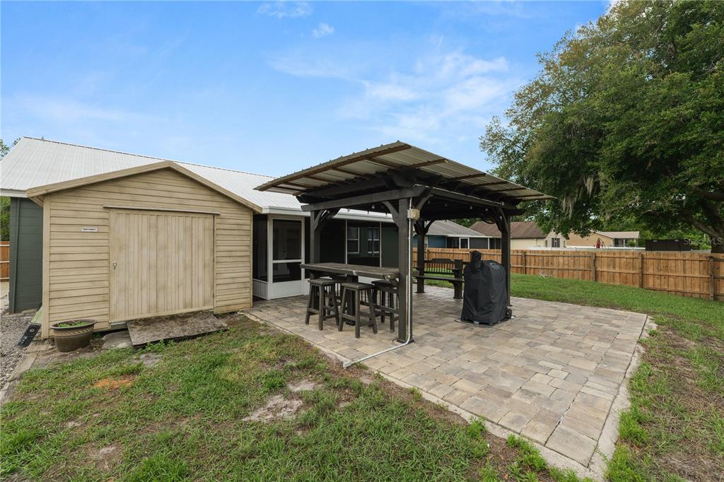 225 Lindale Street Lakeland, FL 33809 - Photo 35 of 37 a view of a house with backyard and sitting area