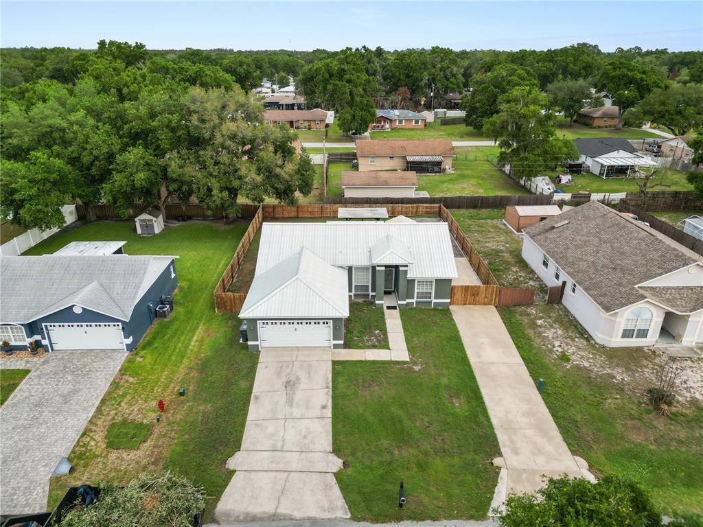 225 Lindale Street Lakeland, FL 33809 - Photo 4 of 37 an aerial view of a house with a yard