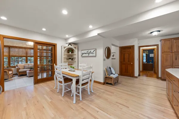 a bathroom with a sink toilet and mirror