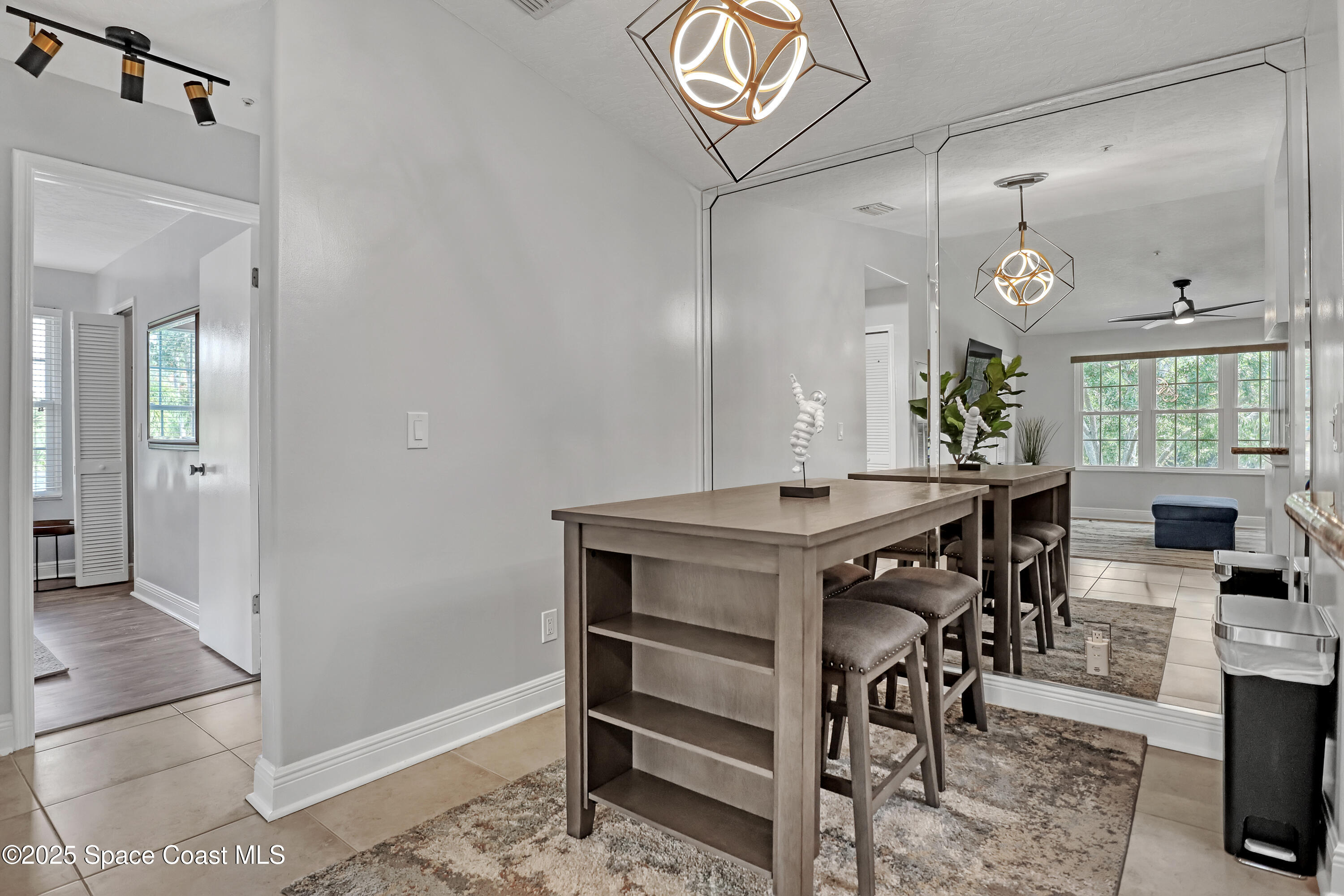 7667 North Wickham Road, Unit 224 Melbourne, FL 32940 - Photo 11 of 32 a view of a room with furniture and window