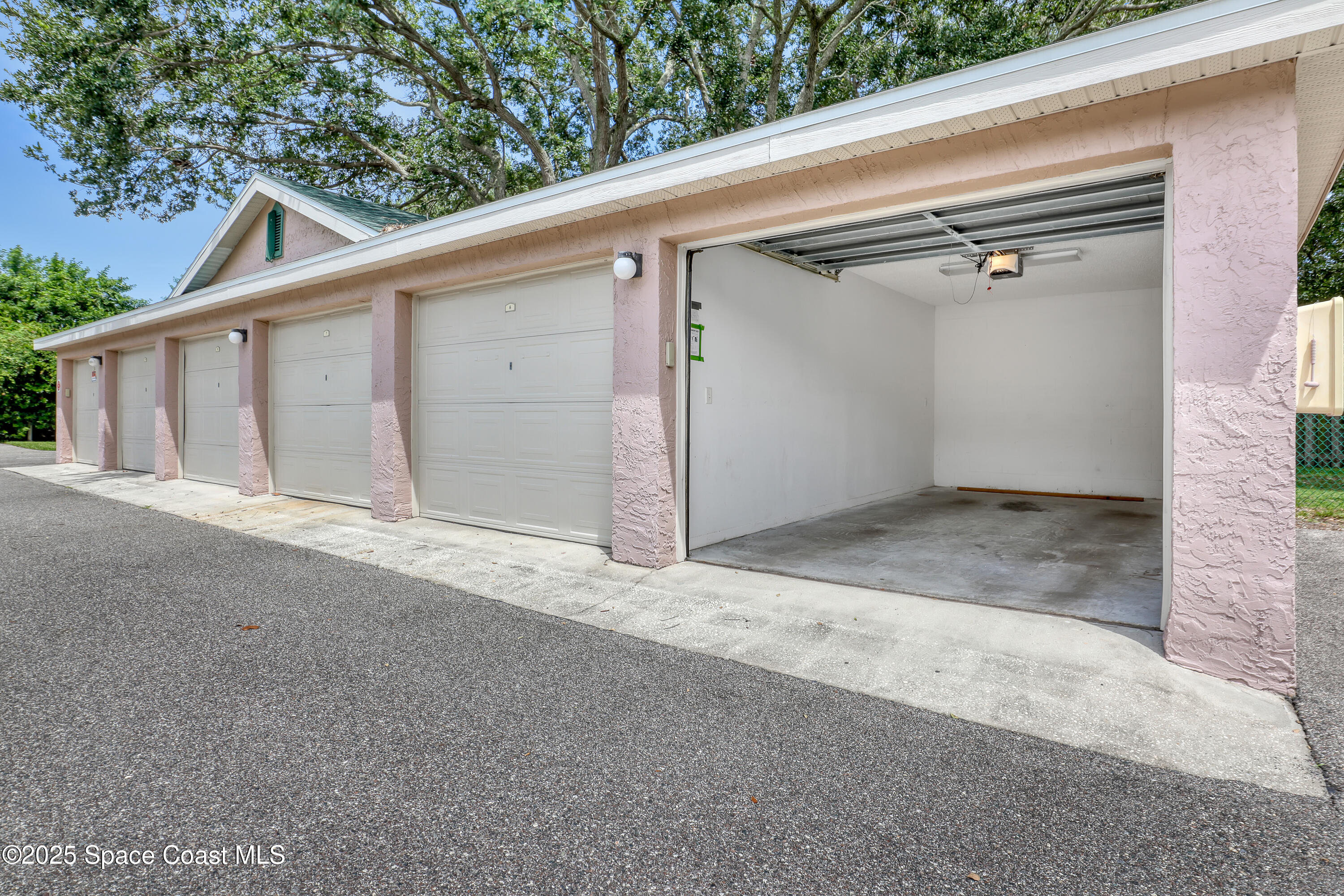 7667 North Wickham Road, Unit 224 Melbourne, FL 32940 - Photo 27 of 32 a view of a garage