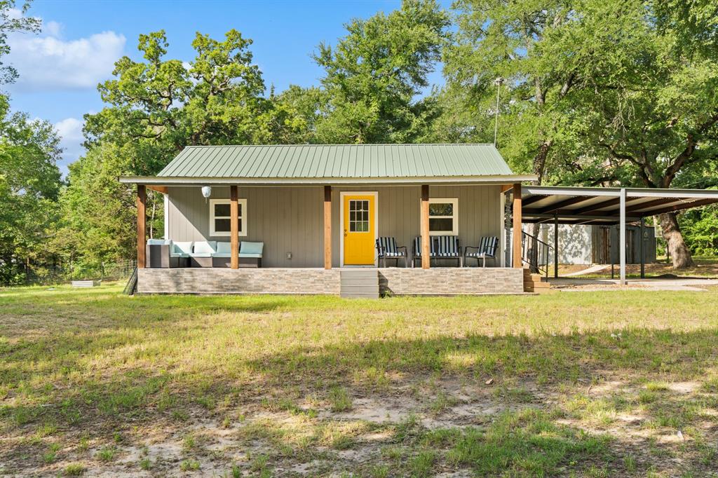 17790 County Road 345 Terrell, TX 75161 - Photo 3 of 37 a view of a house with pool and chairs next to a yard