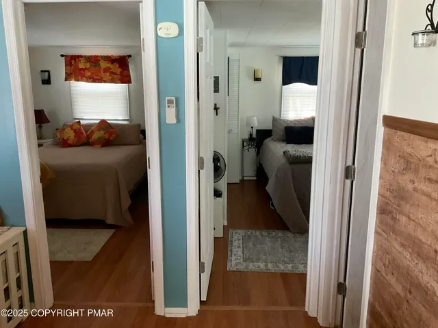 a bedroom with a bed and cabinets