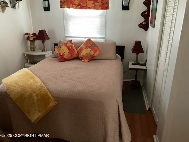 a bathroom with a sink a mirror and a shower