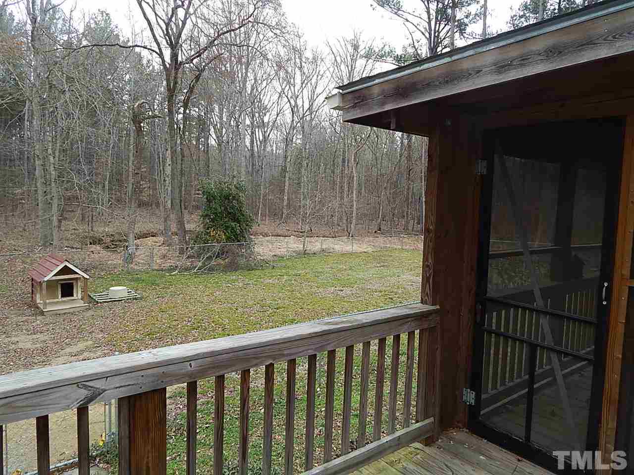 1427 Torredge Road Durham, NC 27712 - Photo 14 of 17 a view of a porch with a yard