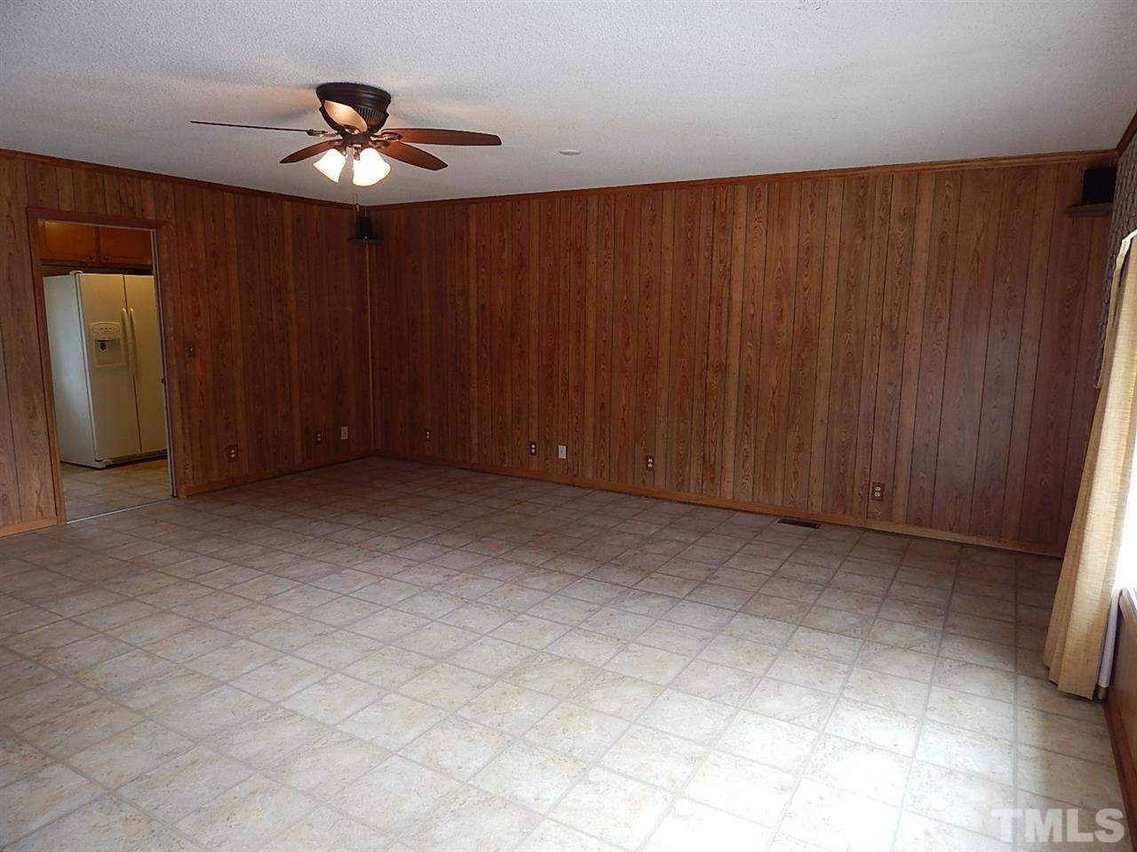 1427 Torredge Road Durham, NC 27712 - Photo 9 of 17 a view of an empty room with a window