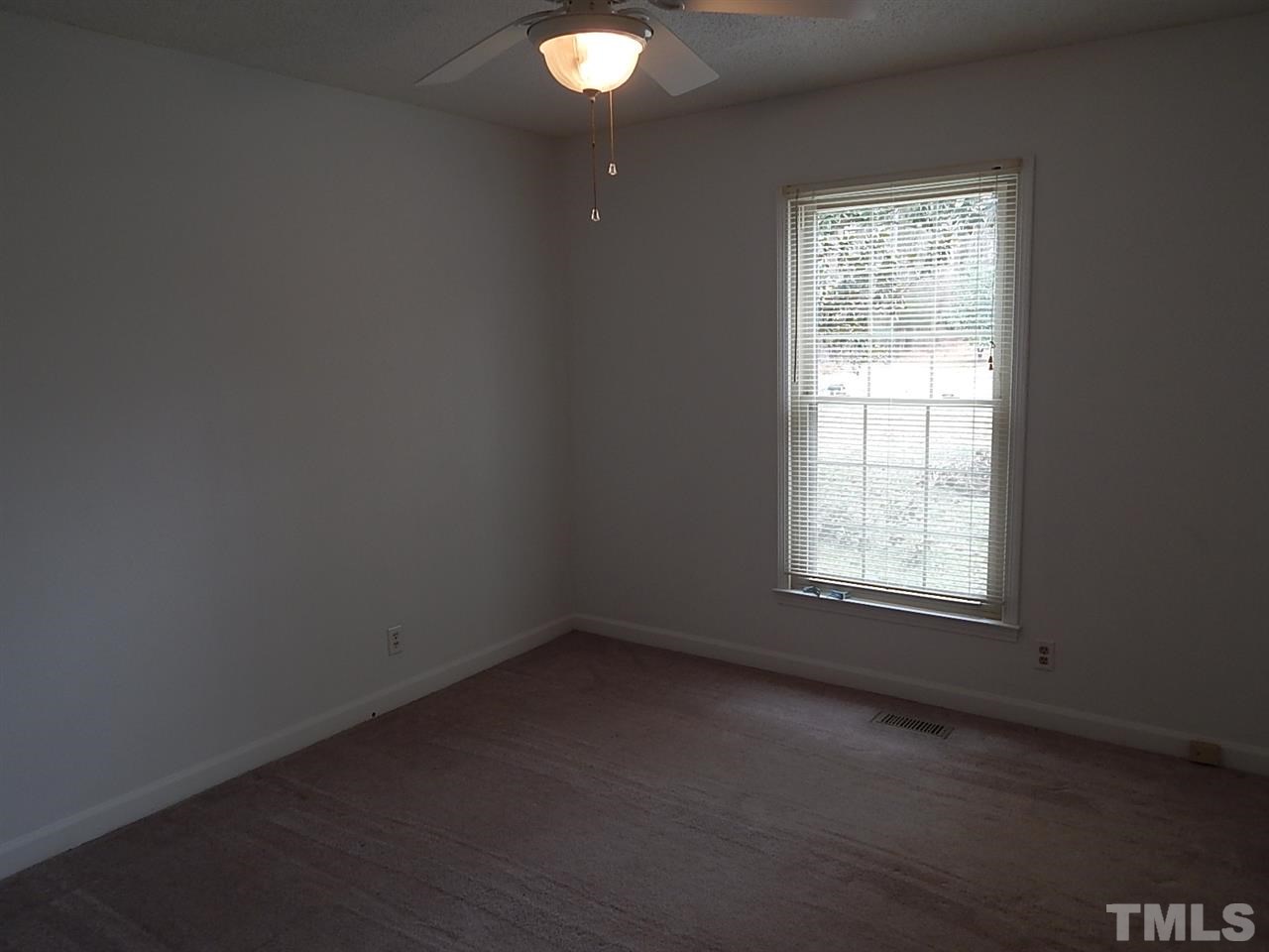 1427 Torredge Road Durham, NC 27712 - Photo 10 of 17 an empty room with a window
