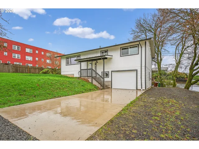 a view of a backyard of a house
