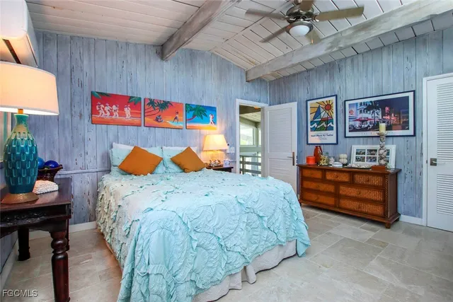 a bed room with a bed and a couch