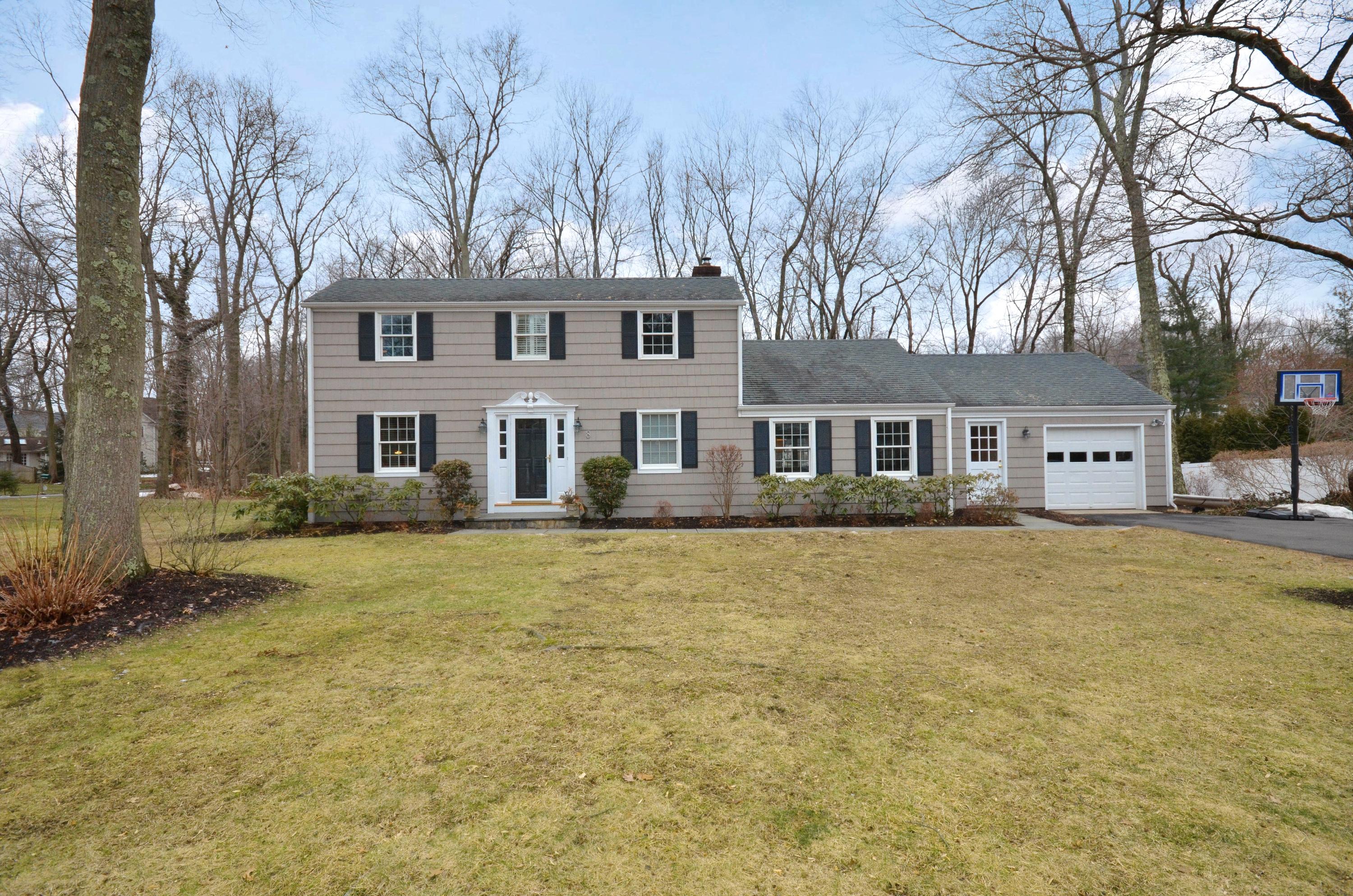 8 Revere Road Darien, CT 06820 - Photo 1 of 1 front view of a house with a yard