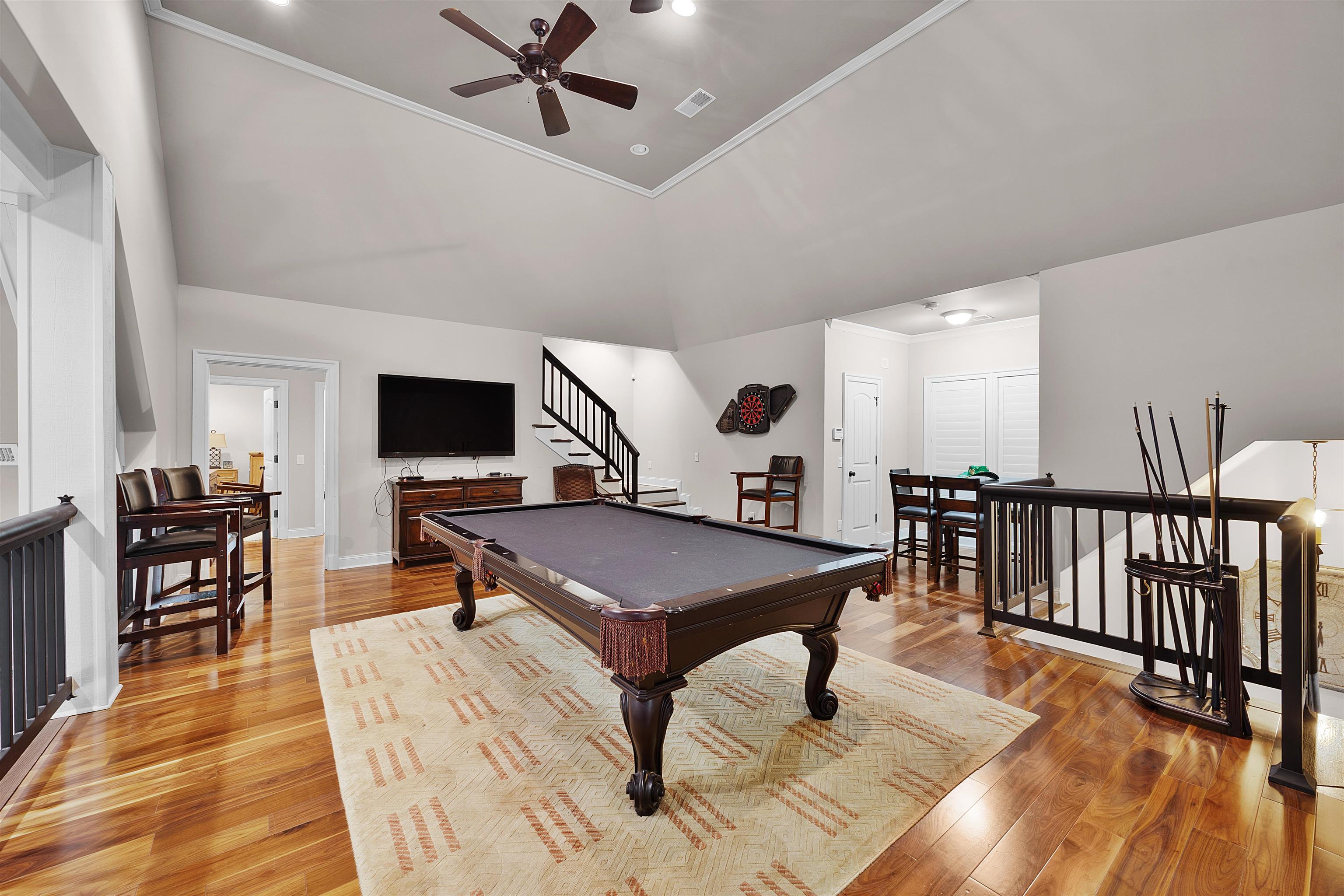 25 Caney Hollow Road Counce, TN 38326 - Photo 21 of 40 Rec room with a ceiling fan, billiards table, light wood-style floors, crown molding, and vaulted ceiling