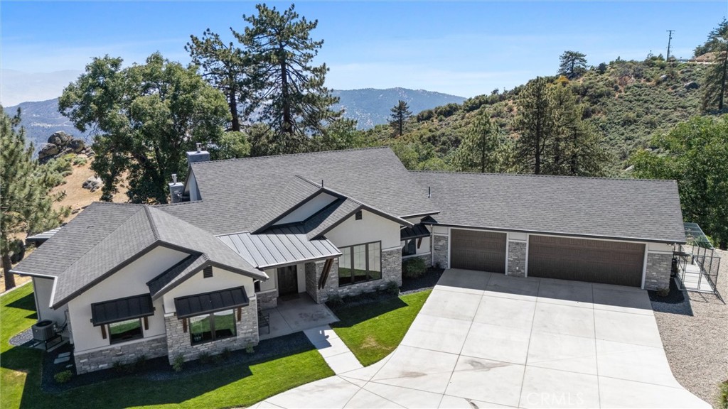 27300 Stirrup Way Tehachapi, CA 93561 - Photo 2 of 45 a aerial view of a house with a yard