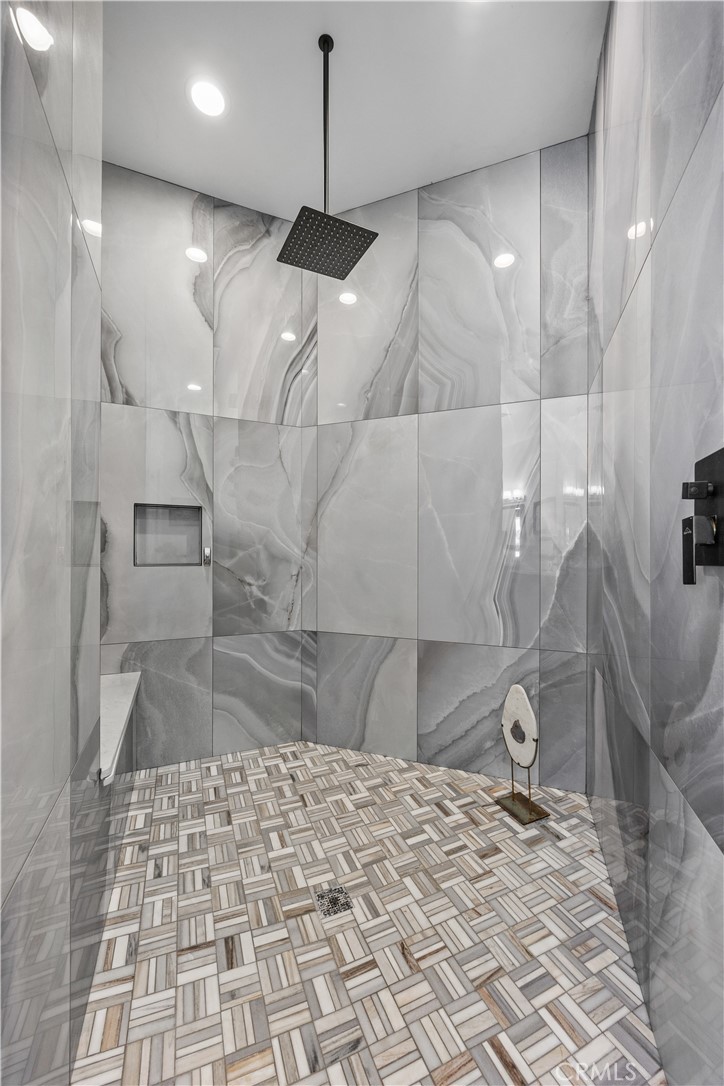 27300 Stirrup Way Tehachapi, CA 93561 - Photo 25 of 45 a bathroom with a sink and a shower