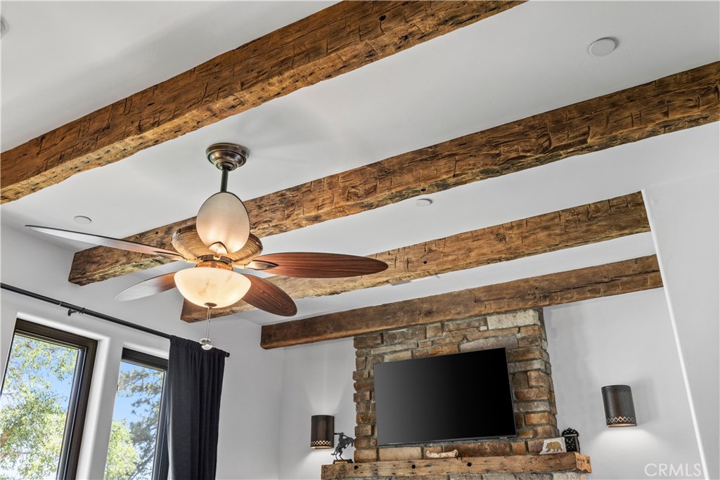 27300 Stirrup Way Tehachapi, CA 93561 - Photo 28 of 45 a view of living room with furniture and a flat screen tv