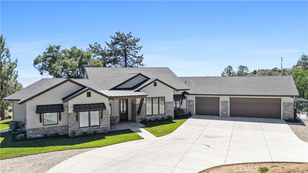 27300 Stirrup Way Tehachapi, CA 93561 - Photo 4 of 45 a house with garden in front of it