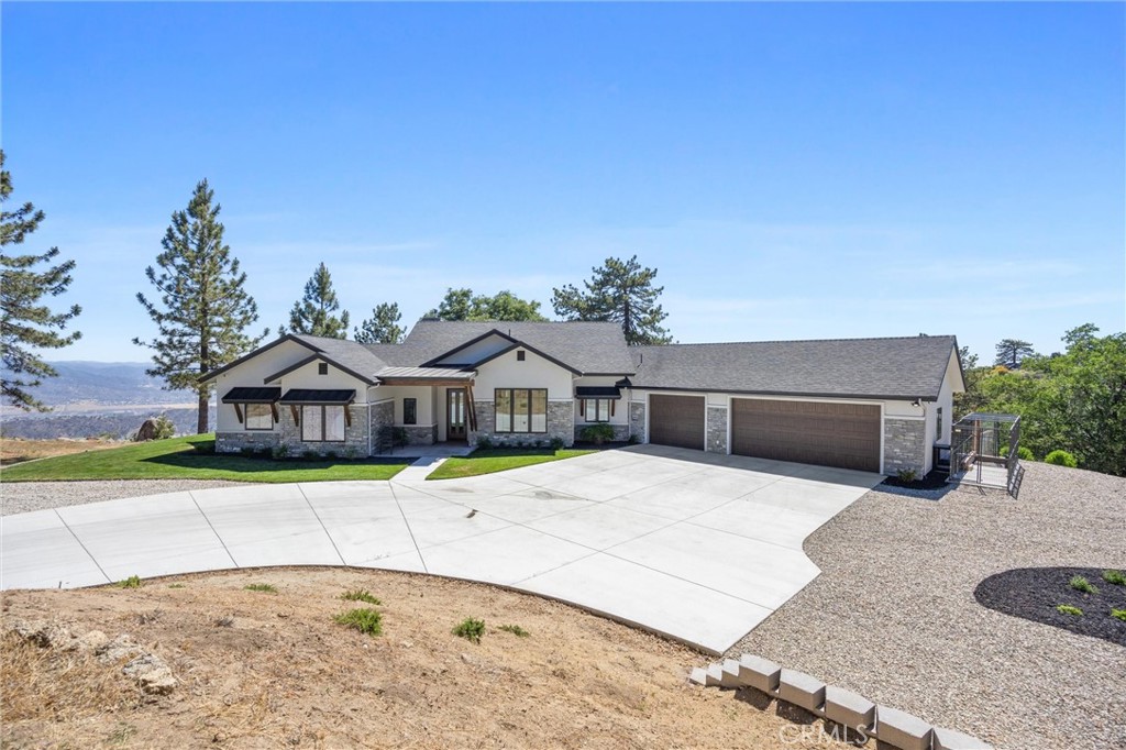 27300 Stirrup Way Tehachapi, CA 93561 - Photo 44 of 45 a front view of a house with a yard