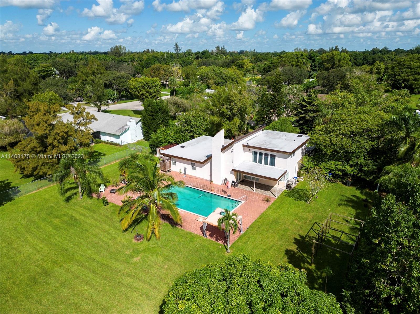 18520 Southwest 58th Street Southwest Ranches, FL 33332 - Photo 18 of 20 an aerial view of a house