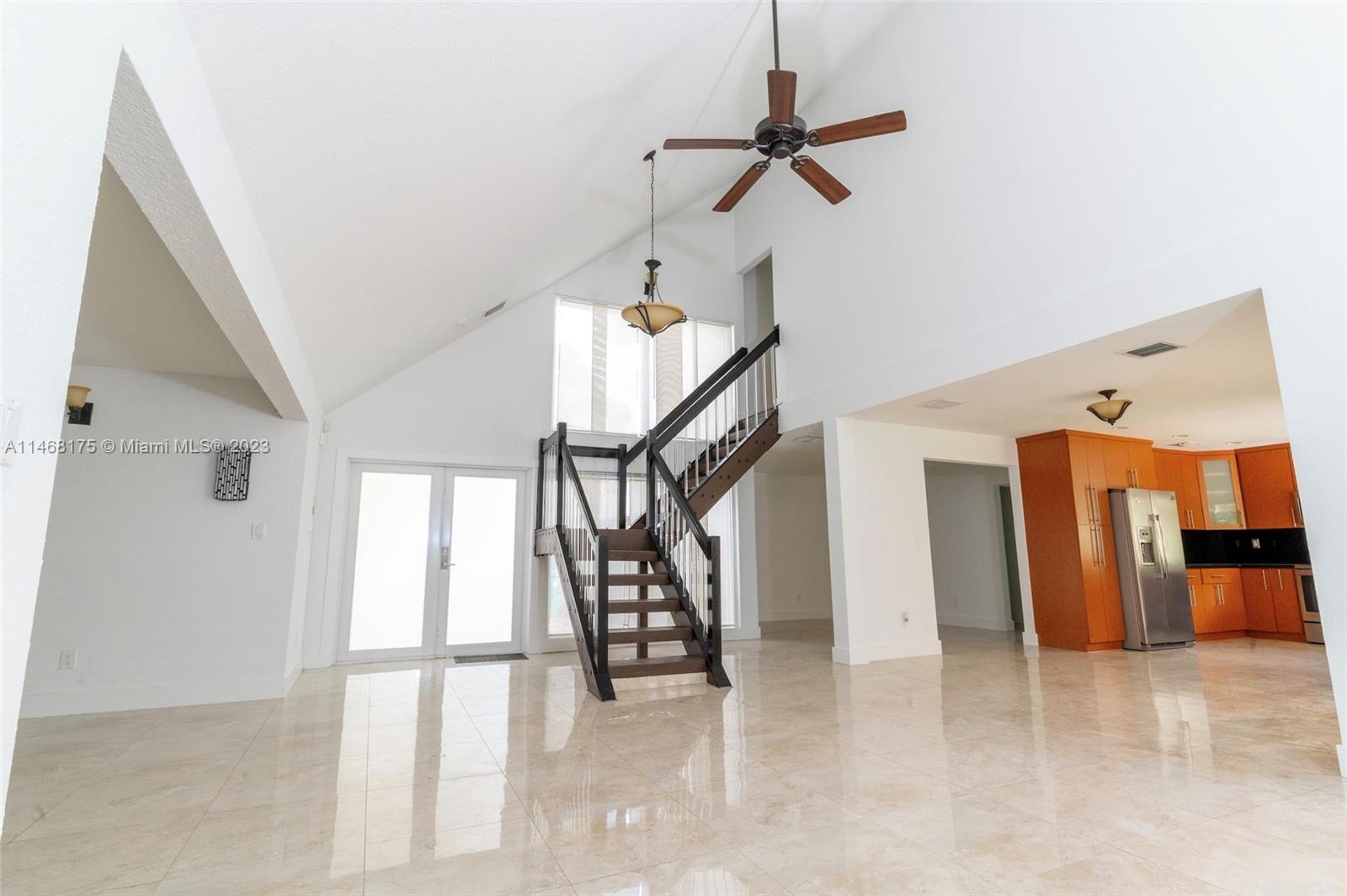 18520 Southwest 58th Street Southwest Ranches, FL 33332 - Photo 4 of 20 a view of entryway and hall with a front door
