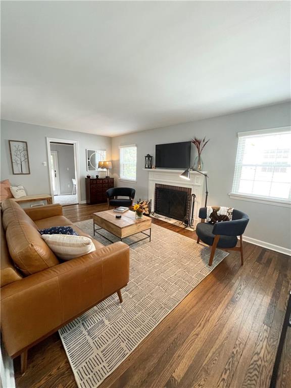 138 Mohawk Drive Pittsburgh, PA 15228 - Photo 2 of 24 a living room with furniture a flat screen tv and a fireplace