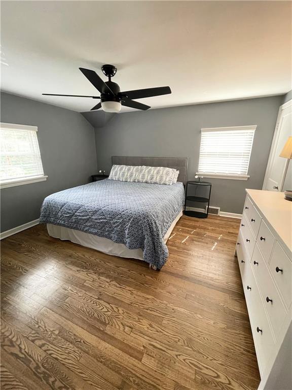138 Mohawk Drive Pittsburgh, PA 15228 - Photo 13 of 24 a spacious bedroom with a bed and wooden floor